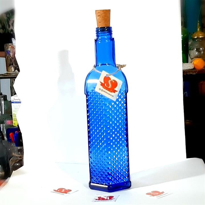 بطری نیکا آبی کبالتی یک لیتری با درب چوب پنبه وارداتی تهیه و تولید شده از با کیفیت ترین مواد بلور سازی بصورت دست ساز